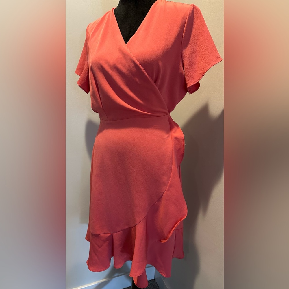 Women’s size M Dress.   Peach in Color.   Like New.